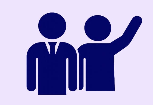 Two simple blue stick figures; the Adviser wears a tie, and the Trainee raises an arm as if waving. The background is light purple.