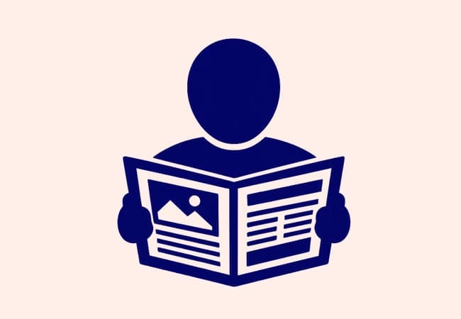 A simple dark blue icon of a person holding an open newspaper with a picture and text.
