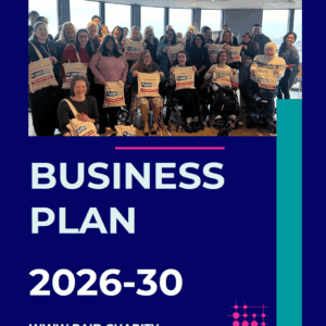 RAID Business Plan 2026-2030 A diverse group of people, some in wheelchairs, smile and hold RAID charity bags, highlighting the impact featured in RAID’s latest publications. Text below reads: BUSINESS PLAN 2026-30 WWW.RAID.CHARITY. The background is blue with pink and teal accents.